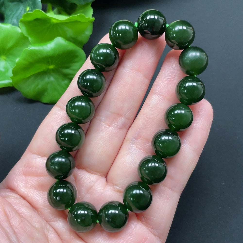 Hetian jade bracelet with 11.9mm beads, weight approximately 45.24g, crafted by HKHQ, showcasing smooth, polished jade stones.