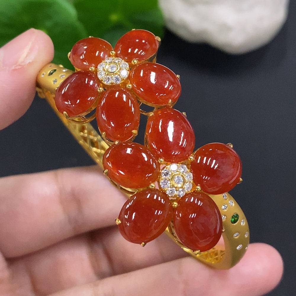HUILIU HQ jadeite cabochon bracelet with colorless diamond accents, showcasing polished green jade stones on a delicate jewelry band.