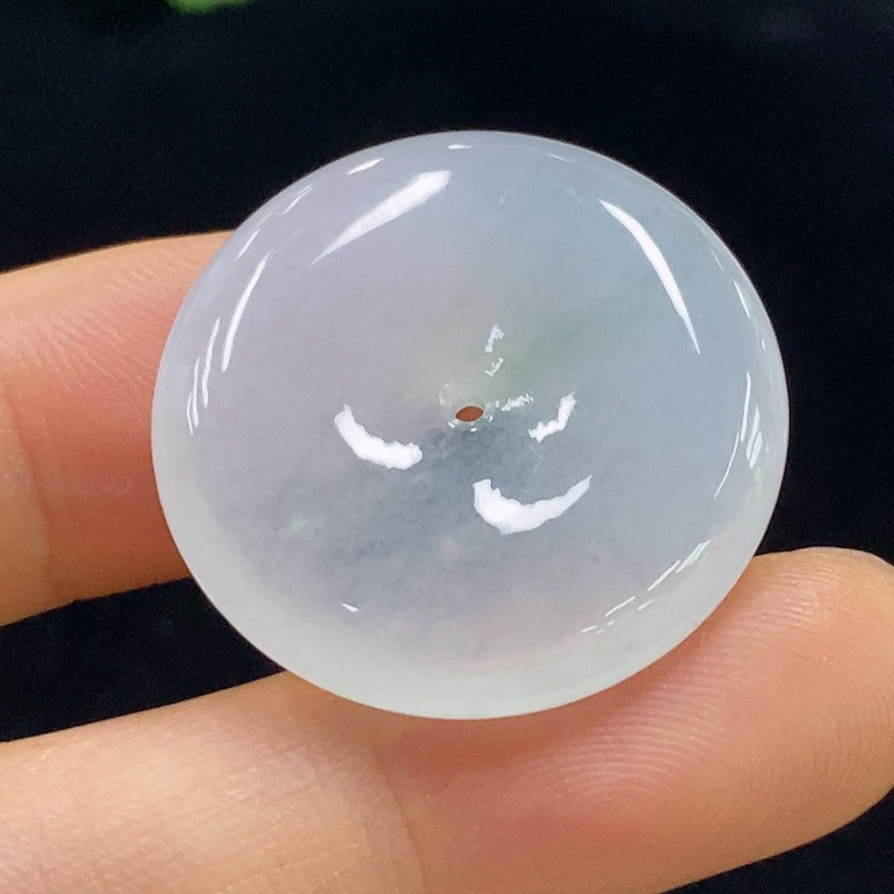 Huiliu certified jadeite Peace Knot pendant by HKHQ featuring a smooth, polished jade necklace with intricate knot design.