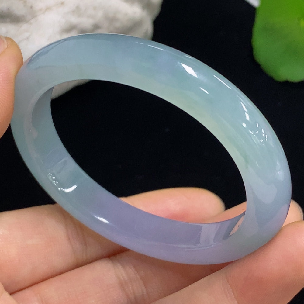 HKHQ Jadeite oval bangle in size 53.2, weighing 38.2g, showcasing smooth, polished jadeite with a classic oval shape.