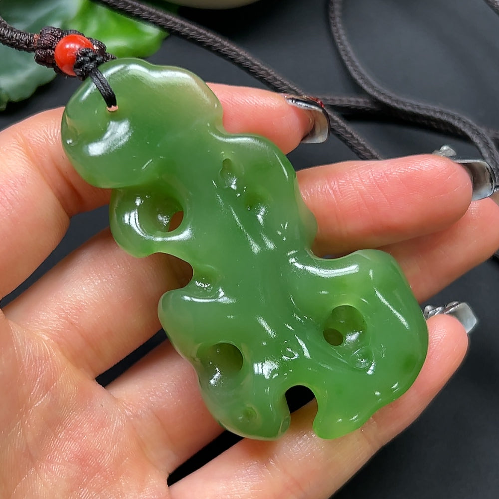 HKHQ Hetian Jade and coral stone pendant necklace with rope, weighing approximately 48.17g, featuring intricate natural stone details.