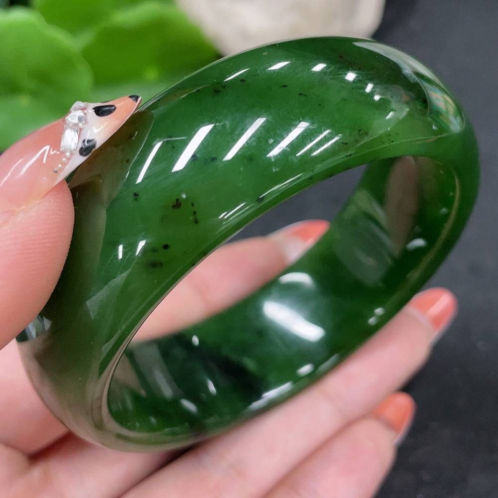 Huiliu certified Hetian Jade green round bracelet with smooth polished surface, showcasing elegant jewelry craftsmanship.