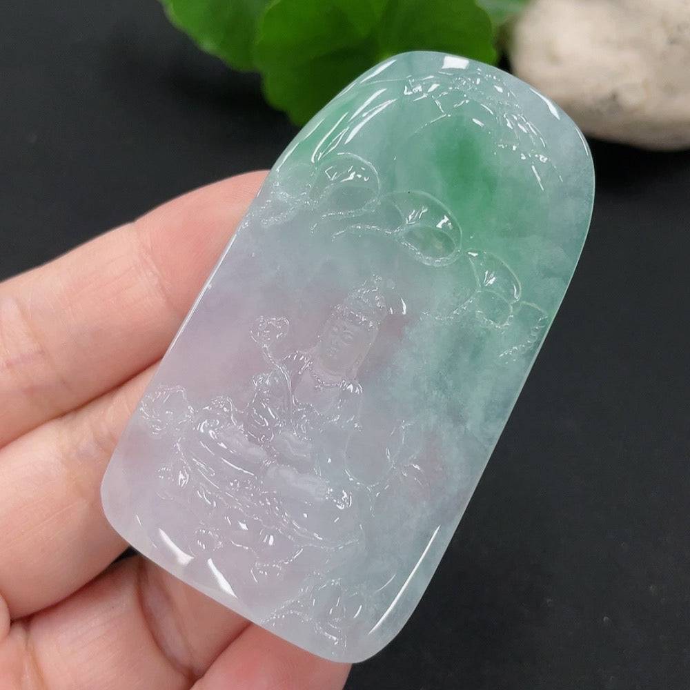 Jadeite Guanyin pendant from HUILIU HQ, carved jade figure weighing approximately 28.8g, detailed natural jade craftsmanship.