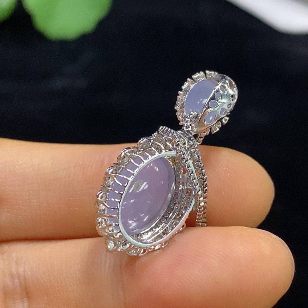 Jadeite cabochon inlaid pendant with diamond accents on 18k chain, featuring a HUILIU HQ design, weighing approximately 3.24g.