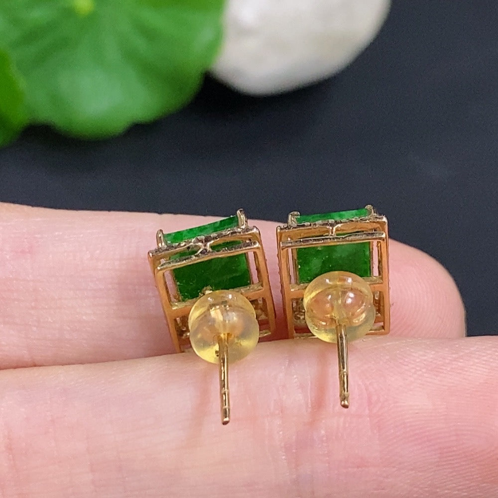 Jadeite ear studs with diamond accents and 18k gold settings, featuring a delicate, elegant design and a total weight of around 2 grams.
