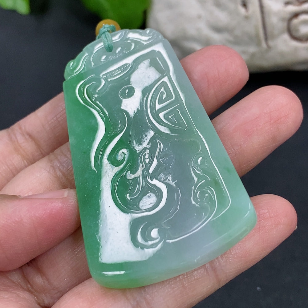 Antique Jadeite pendant from HKHQ necklace collection, weighing approximately 32g, featuring a smooth, polished jadeite gemstone.