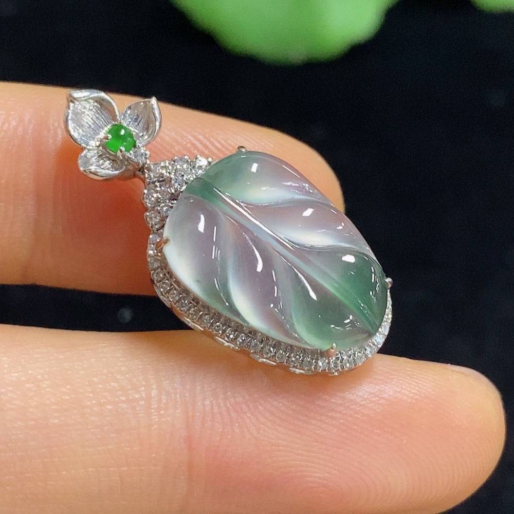 Jadeite leaf pendant with 18k gold and diamond accents, crafted by HUILIU HQ, featuring intricate leaf inlay and sparkling details.
