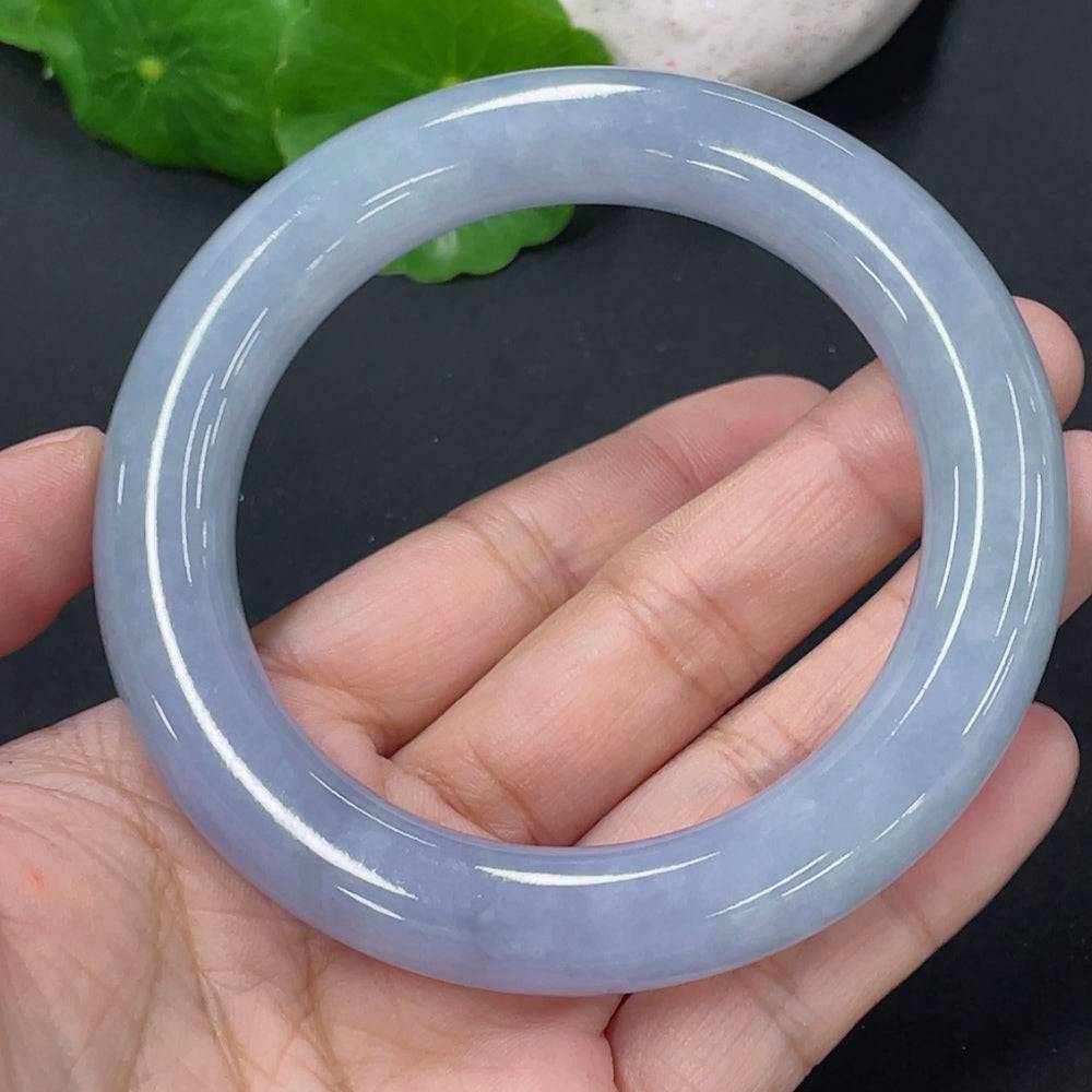 Jadeite round bangle by HUILIU HQ with a smooth surface, weighs approximately 72.67 grams, size 56, showcasing vibrant green jade.