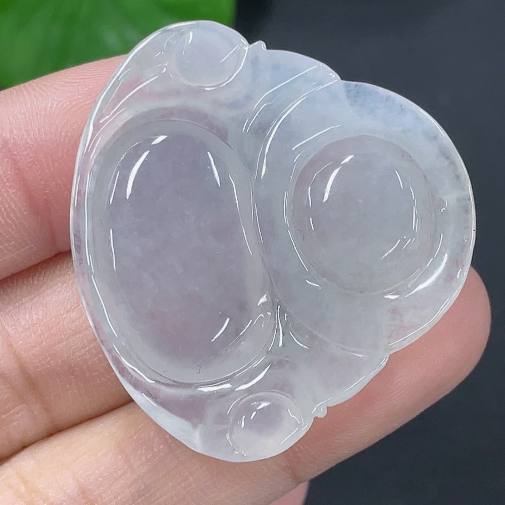 Huiliu Jadeite Buddha pendant featuring a carved jade Buddha figure on a polished jade pendant.