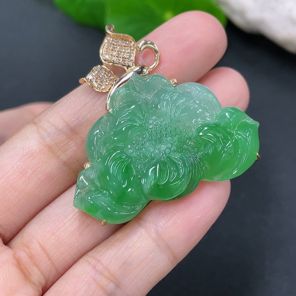 Jadeite flowering prosperity pendant with 18k gold and diamond accents, featuring intricate floral inlay and elegant design.