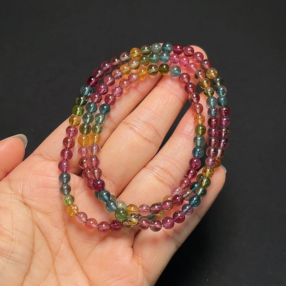 Tourmaline gemstone bead strand with visible organic matter, 4.3mm size, total weight 18.99g, from HKHQ.
