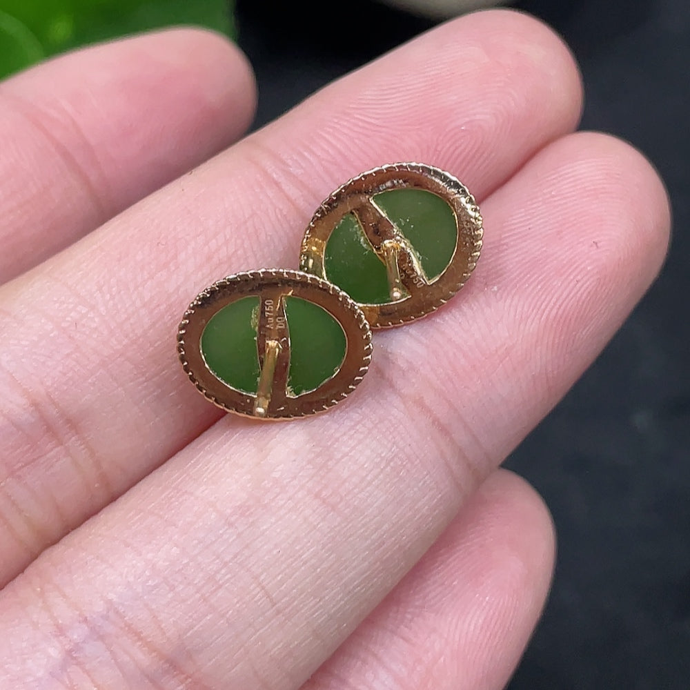 Huiliu certified Hetian jade cabochon earrings with silver setting, showcasing smooth, polished jade stones and elegant design.