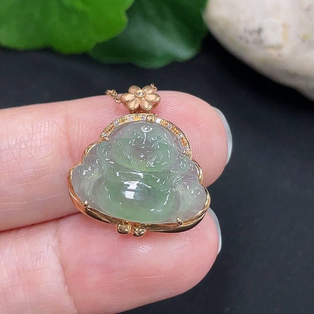 Jadeite Buddha pendant with 18K gold and diamond accents, hanging on a chain, showcasing intricate craftsmanship.