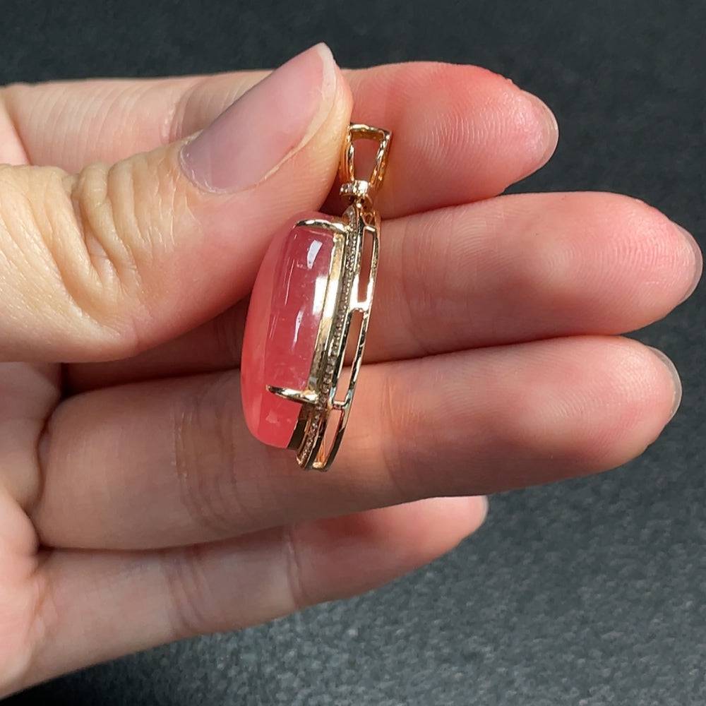 Huiliu Rhodochrosite gemstone pendant with diamond accents, showcasing vibrant pink stone and sparkling diamonds, certified by HUILIU HQ.