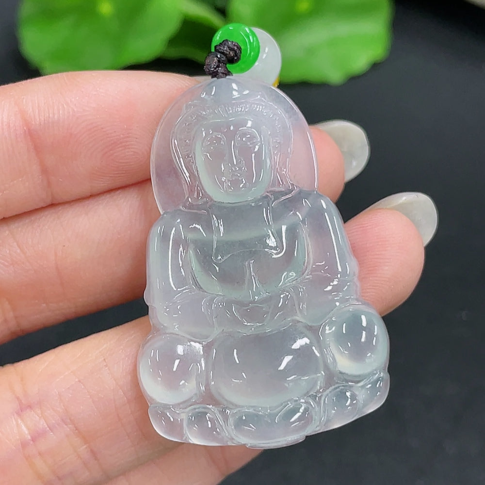 Jadeite Guanyin pendant on a rope necklace featuring intricate carvings and a polished green jade finish.