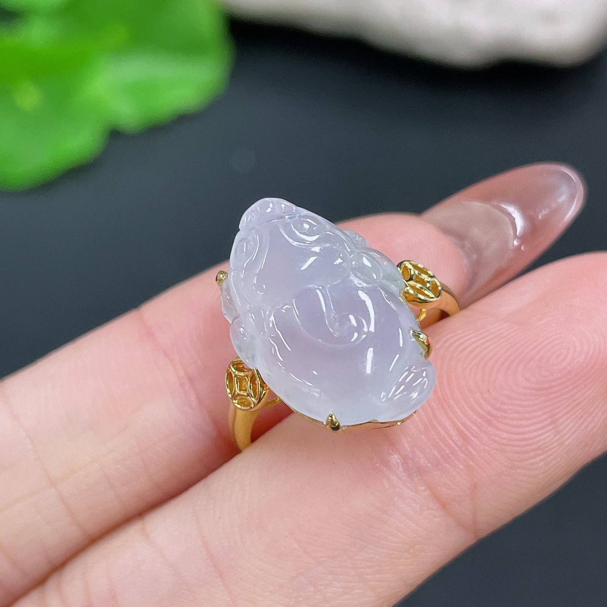 Huiliu Jadeite ring featuring a carved toad inlaid design, crafted from high-quality jade, with a sleek band and detailed craftsmanship.