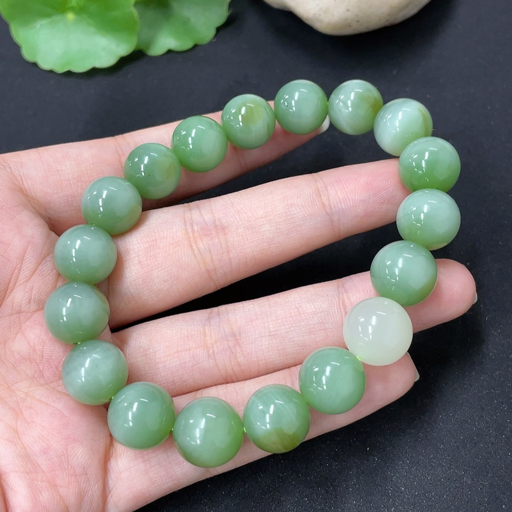 Hetian jade beaded bracelet by HKHQ featuring smooth, polished jade beads on an elegant bracelet for jewelry collection.