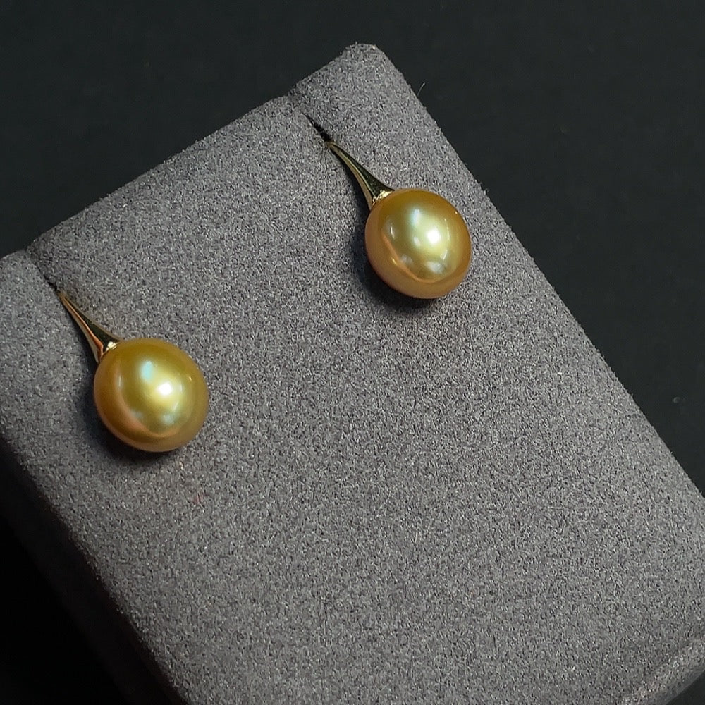 HKHQ seawater pearl earrings set in 18k gold, 10.1mm pearls with a total weight of 4.39g, natural pearl jewelry.