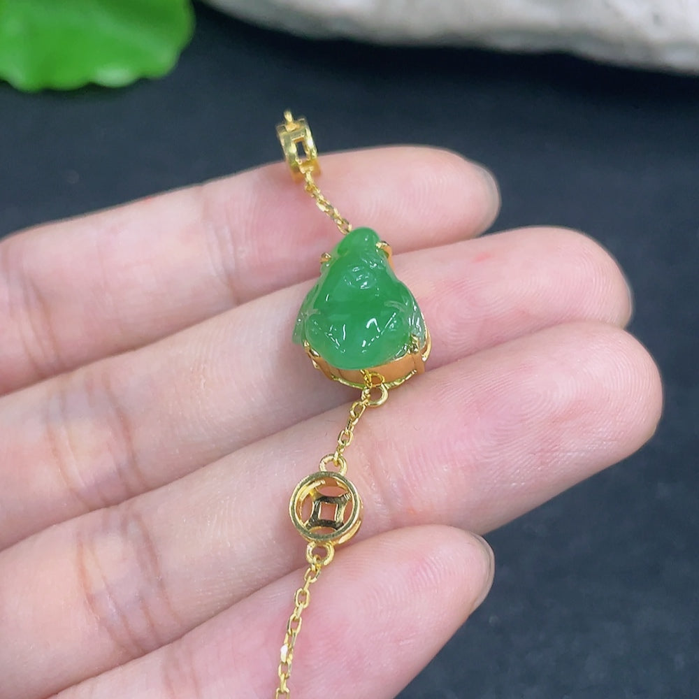 Jadeite bracelet by HKHQ featuring 18K gold accents and diamond accents, showcasing a luxurious and elegant jewelry piece.