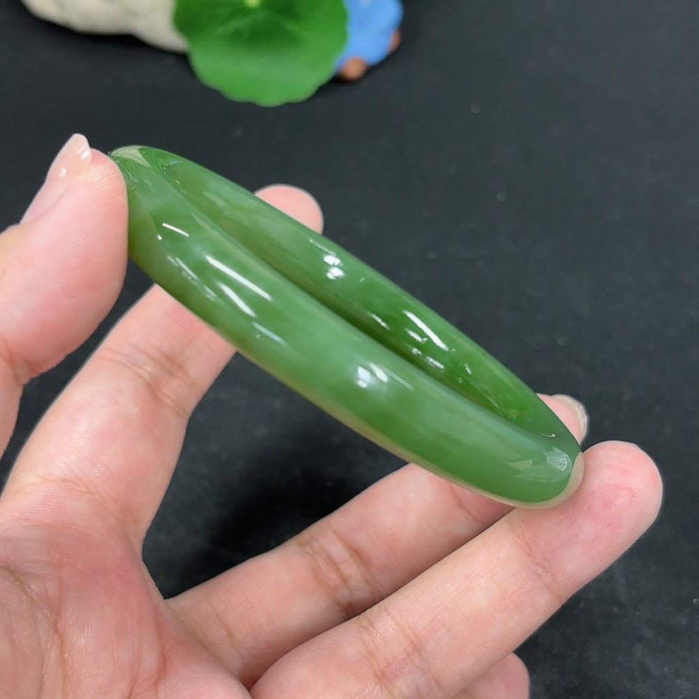 HKHQ Hetian Jade round bangle, size 60, weighing 53.1g, showcasing smooth, polished green jade bracelet with a glossy finish.