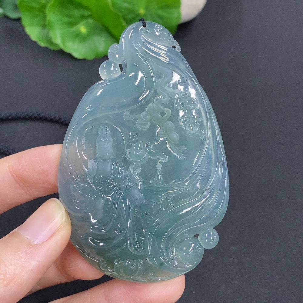 Jadeite Guanyin pendant with non-jadeite beads, weighing approximately 58.5g, featuring intricate carved details and a woven rope.