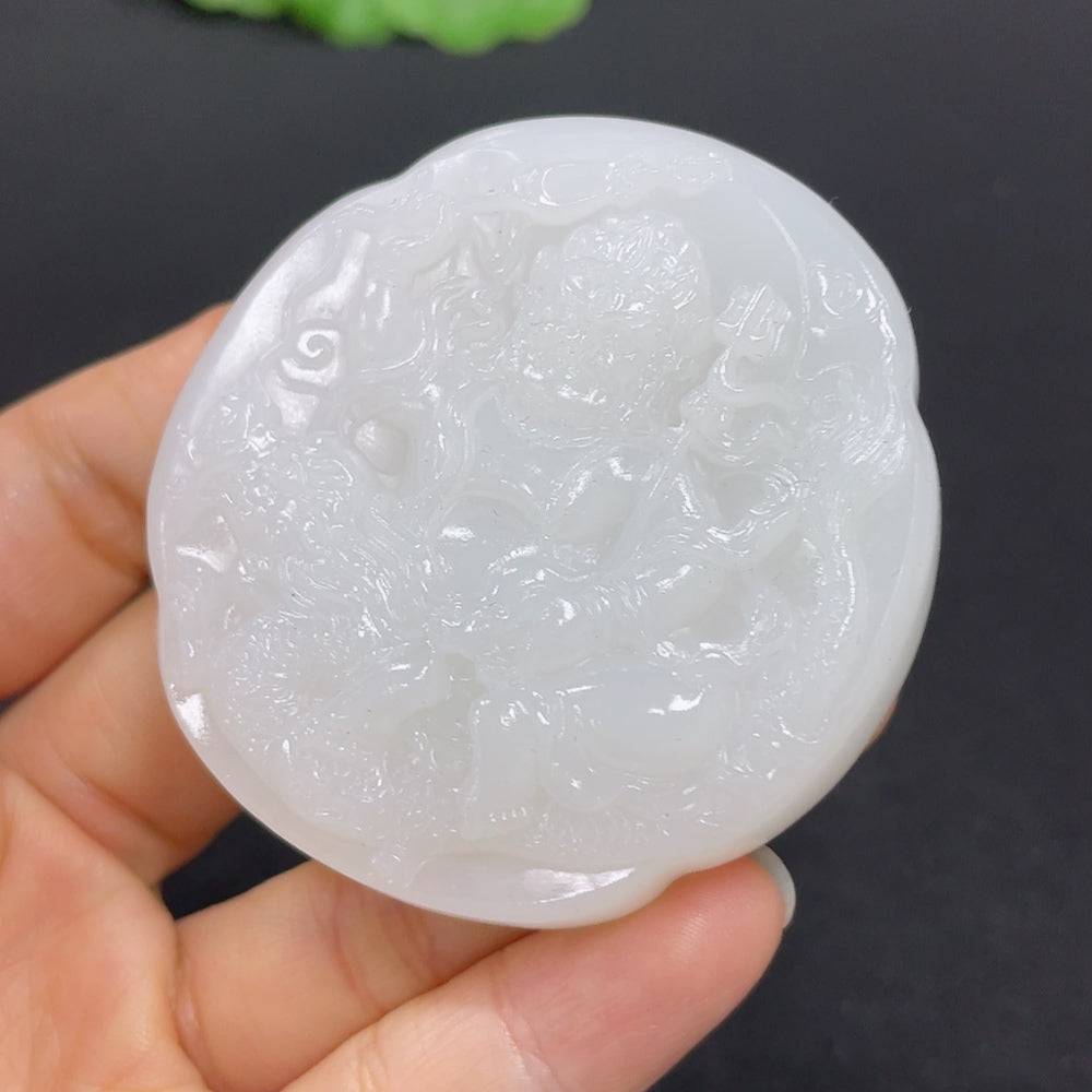 Huiliu HQ Hetian Jade pendant featuring Fud My design, showcasing smooth, polished green jade with intricate carvings.