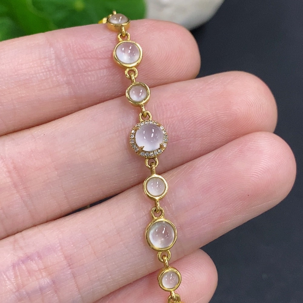 HKHQ jadeite cabochon inlay bracelet with 18k gold and diamond accents, showcasing elegant jewelry design and craftsmanship.