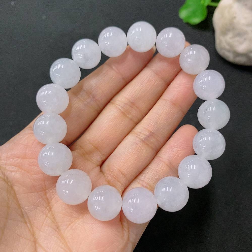 HUILIU HQ jadeite bracelet with 12mm beads, weighing approximately 48.69g, featuring smooth, polished green jade stones.