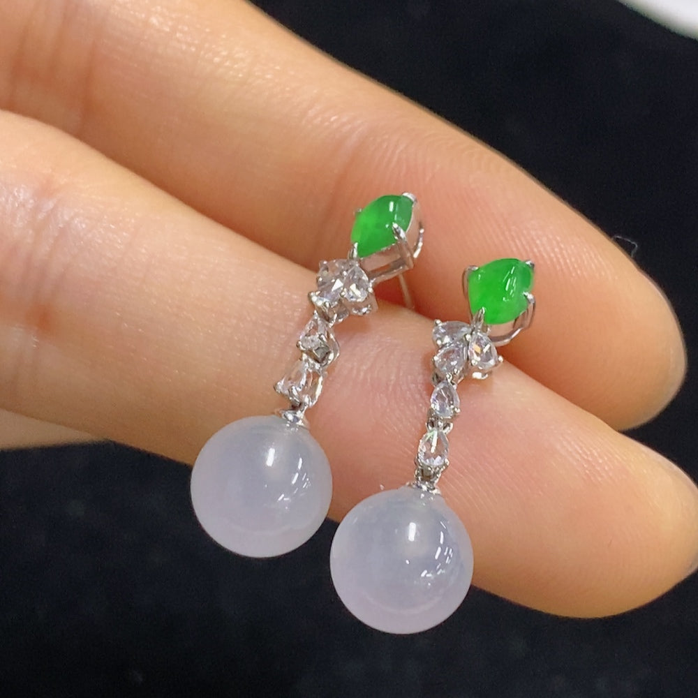 Jadeite earrings set in 18K gold with diamond accents