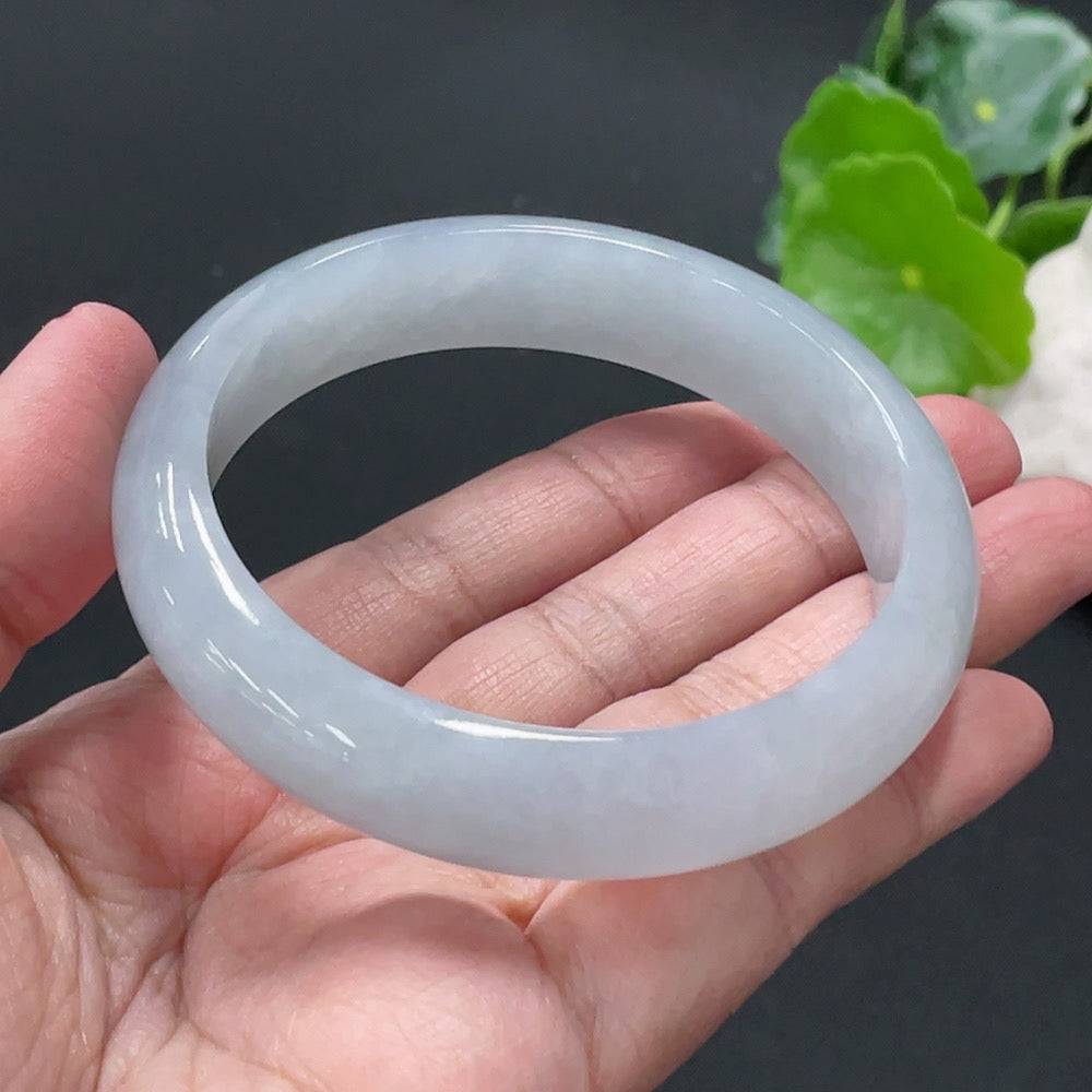 HUILIU HQ jadeite round bangle with a 56g weight and size 57.9, showcasing smooth, polished jade surface.