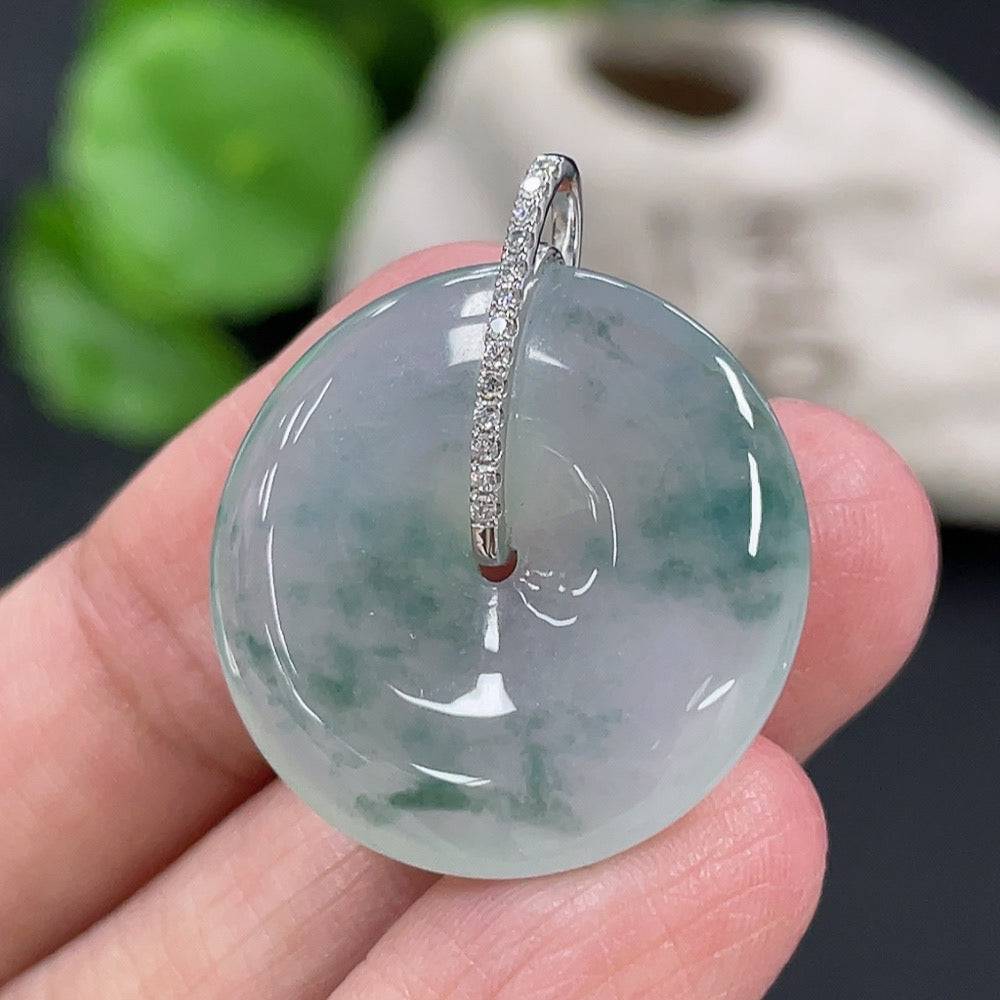 Jadeite pendant with peace buckle design, 18k gold and diamond accents, from HUILIU HQ, weighing approximately 5.94 grams.