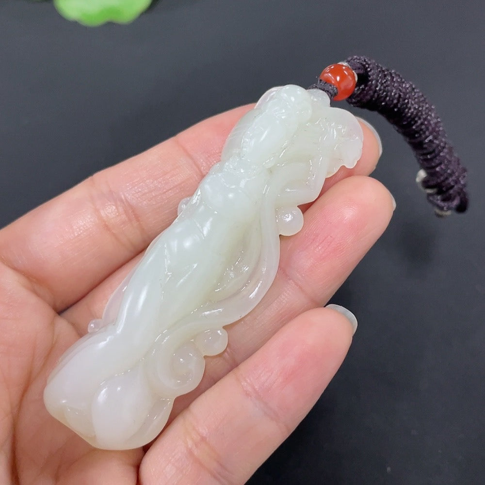Huiliu certified Hetian jade fairy pendant showcasing intricate craftsmanship and smooth green jade surface.