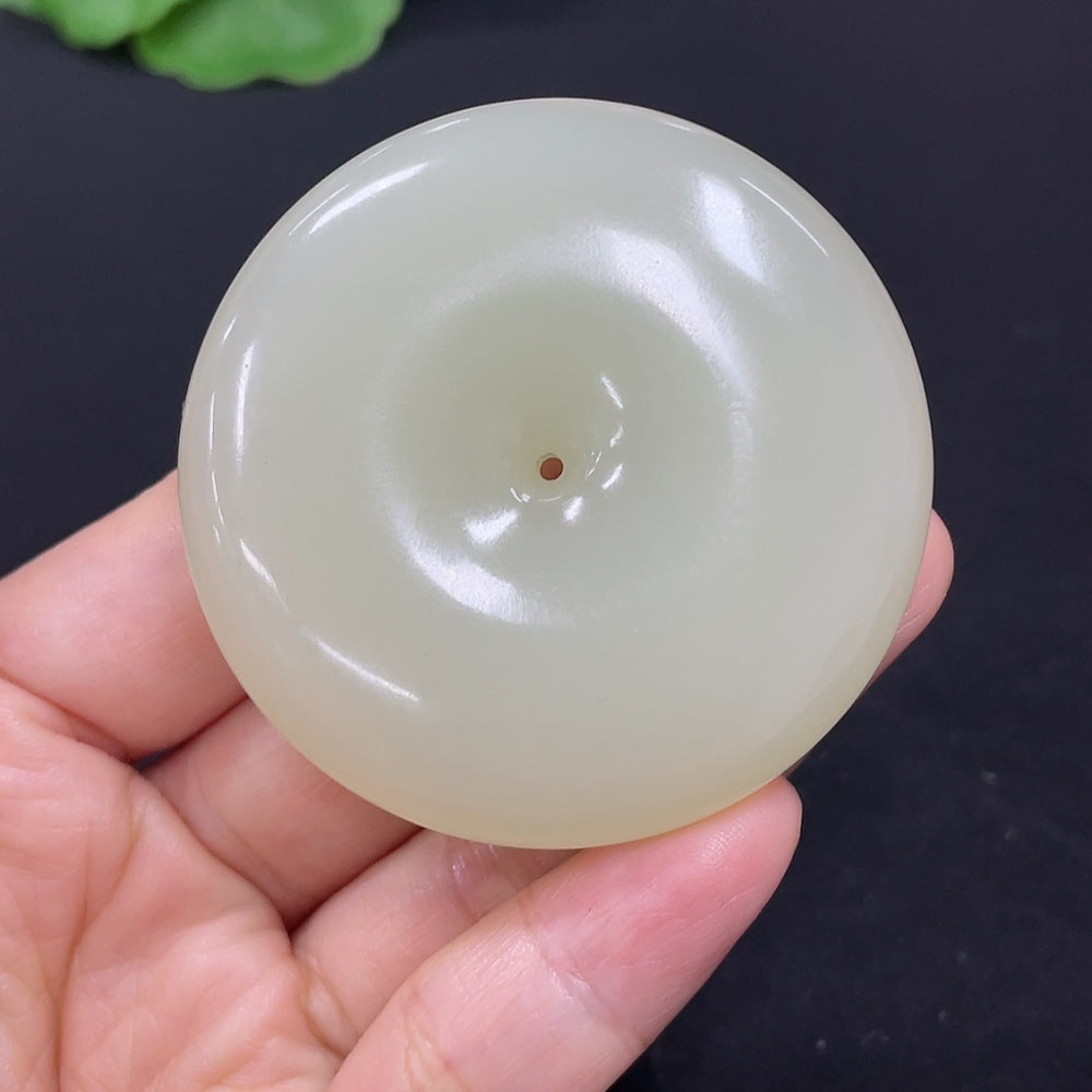 Hetian jade pendant with Peace Knot design from HKHQ, featuring intricate craftsmanship and a total weight of approximately 58.6g.