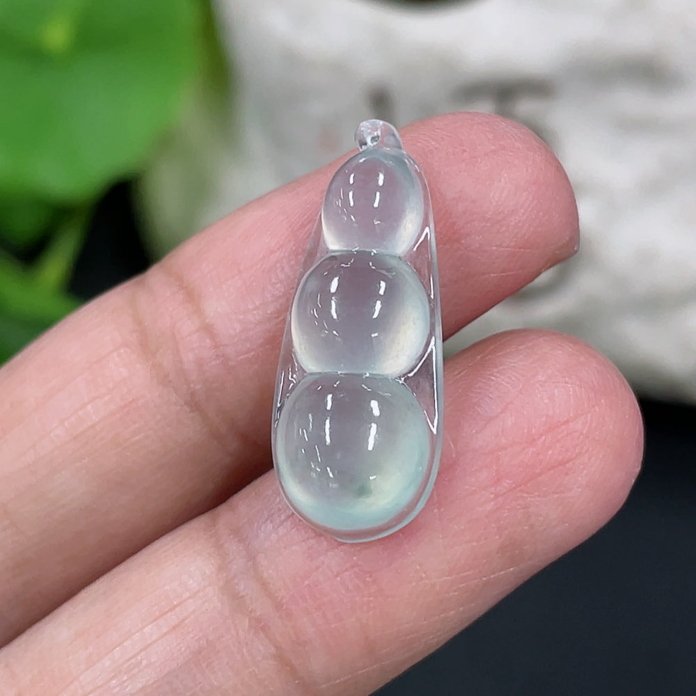 Jadeite auspicious bean inlay piece with intricate design, weighing approximately 1.88g, by HKHQ, showcasing detailed craftsmanship.