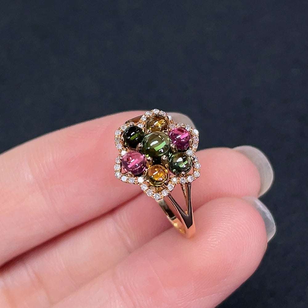 18K gold ring with inlaid tourmaline and diamond accents, elegant jewelry piece by HKHQ featuring colorful gemstones and fine craftsmanship.