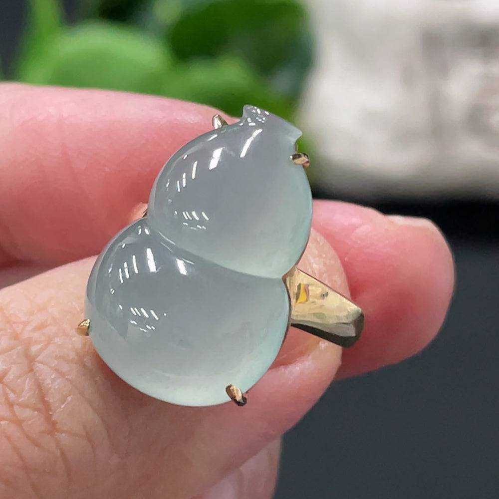Huiliu Jadeite Gourd Inlaid Ring Setting featuring a polished jadeite stone in a detailed gold bezel.