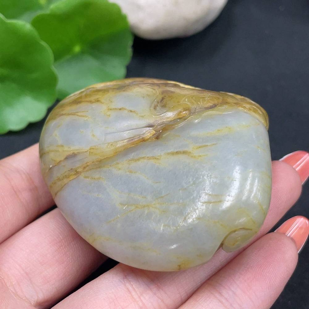 Huiliu certified Hetian jade Zhong Kui handheld carving with intricate details and smooth surface, showcasing traditional craftsmanship.