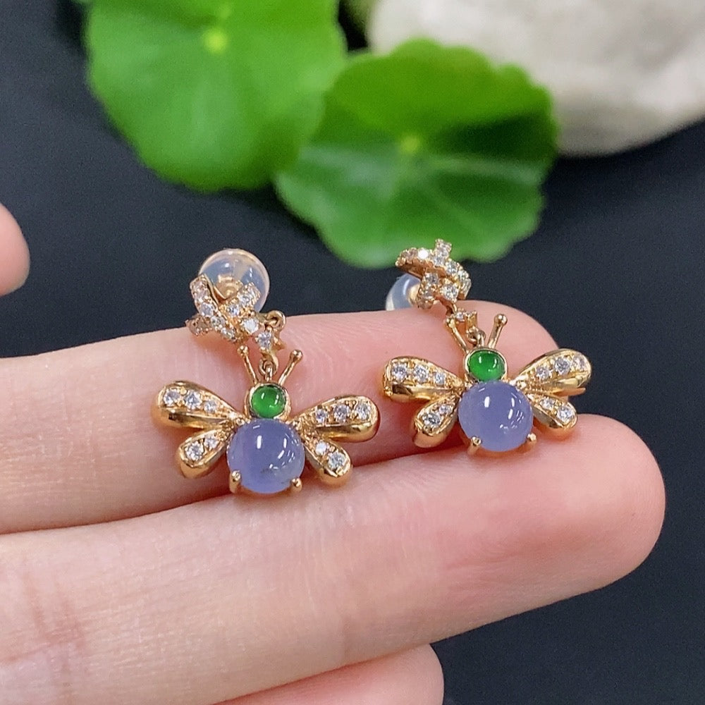 HKHQ jadeite cabochon earrings with 18K gold and diamond accents, showcasing elegant jewelry design and craftsmanship.