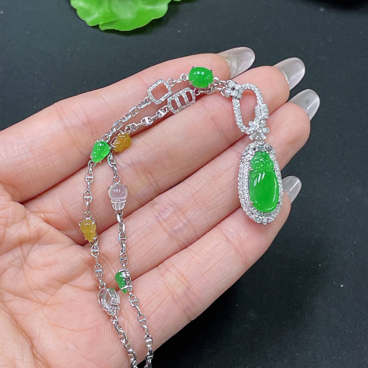 Elegant jadeite necklace by HUILIU HQ featuring 18k gold and diamond accents, total weight approx. 10.4g including chain