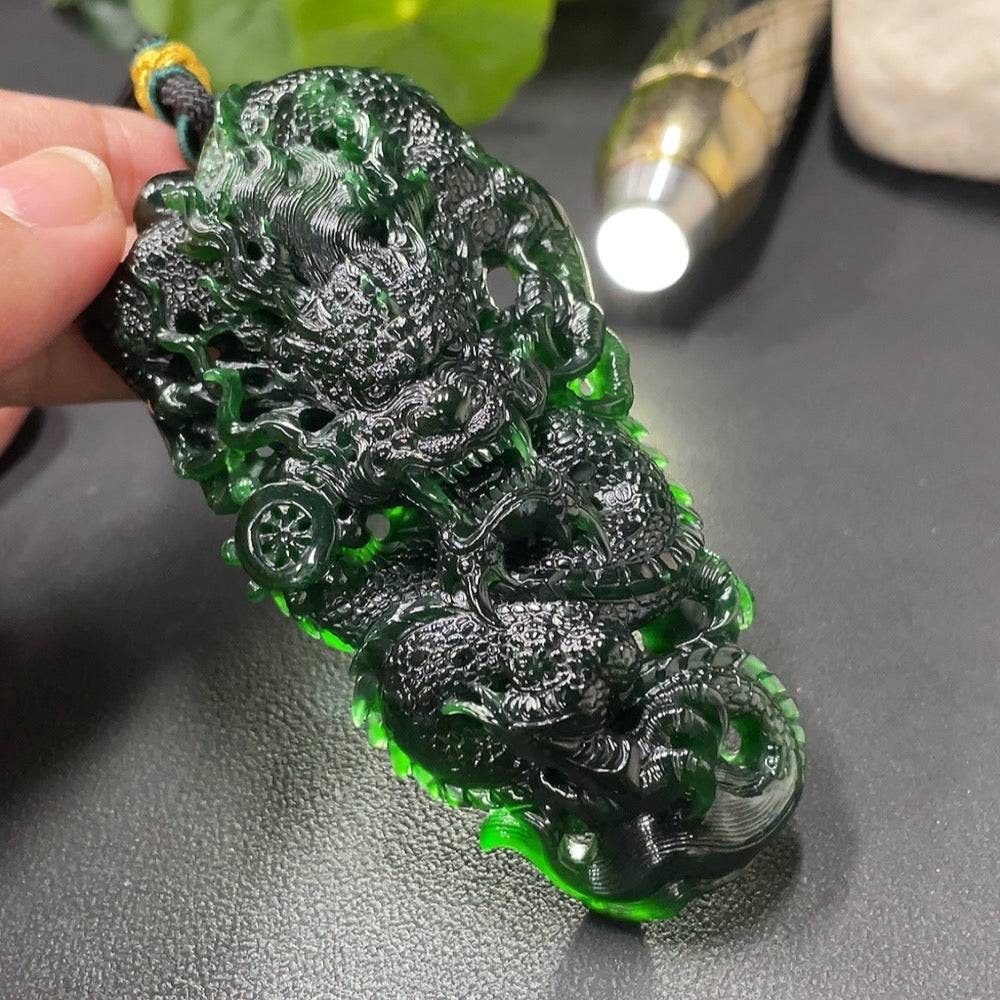 Huiliu Jadeite dragon pendant featuring intricate carved design, showcasing vibrant green jade with polished finish.