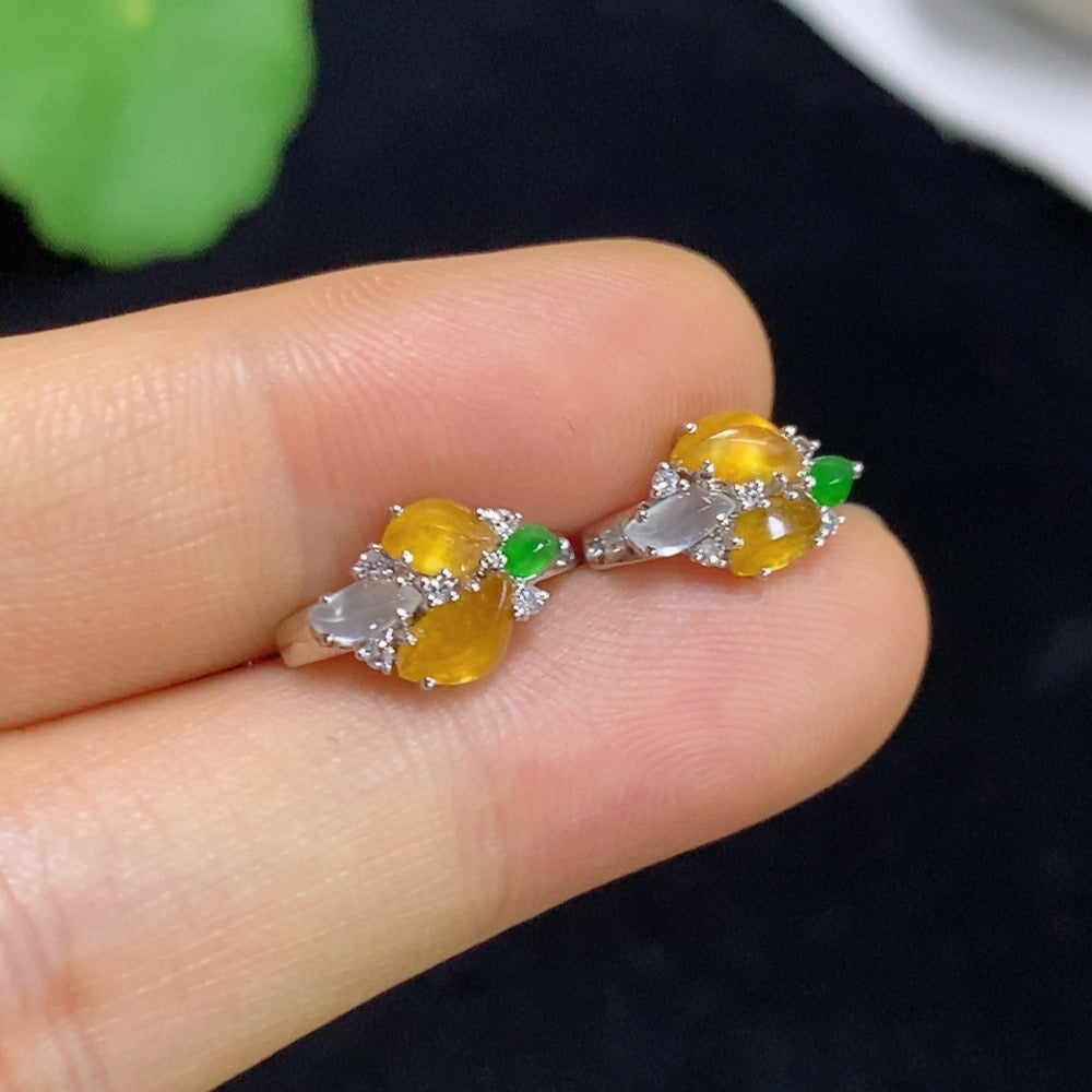 Jadeite ear clips with 18k gold and diamond accents, total weight approximately 2.18 grams