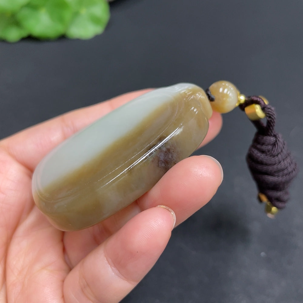 Huiliu Certified Hetian Jade Pendant featuring a plain, smooth jade stone with natural green hues and polished surface.
