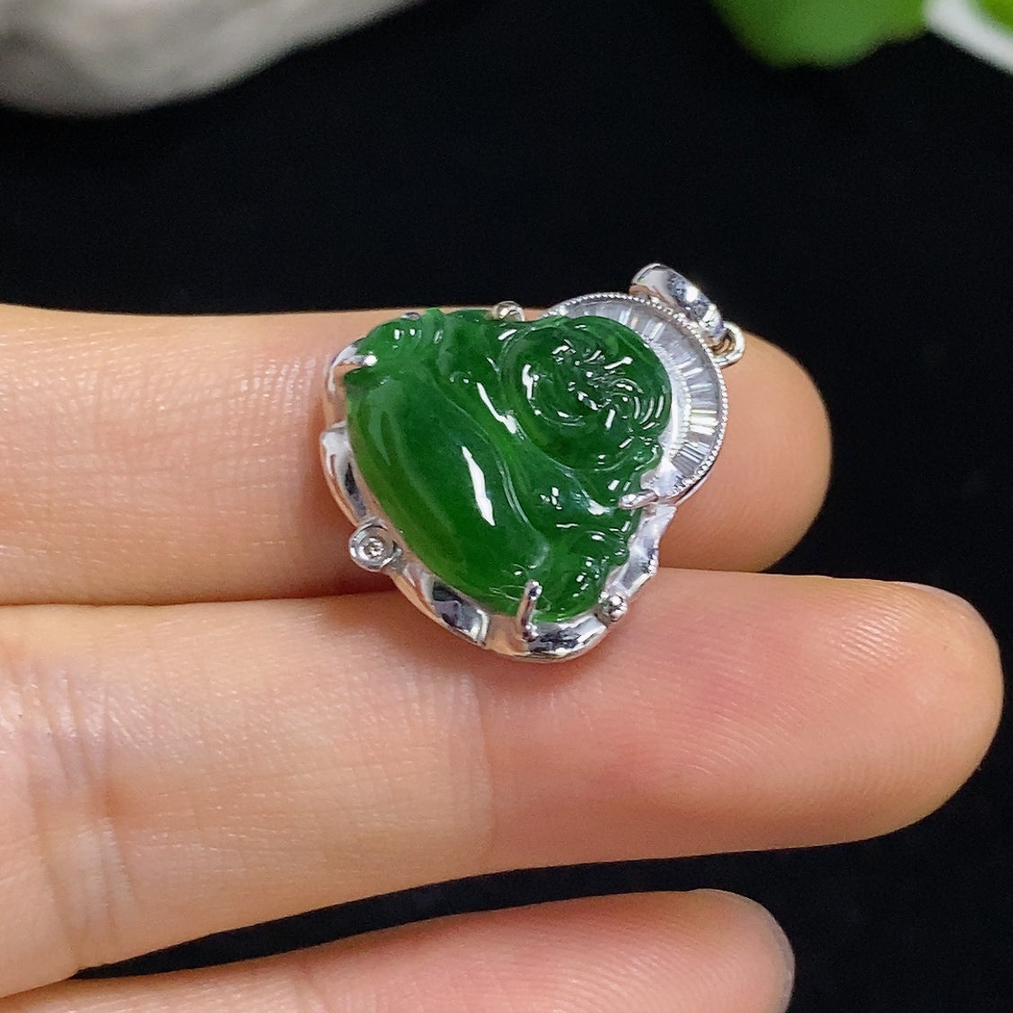 Jadeite pendant Buddha necklace with 18K gold and diamond accents, featuring a detailed Buddha figure on a sleek chain.