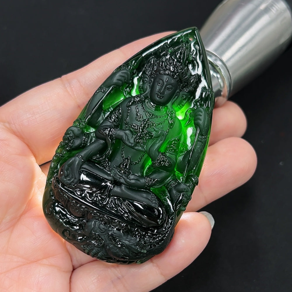 Jadeite Guanyin pendant necklace from HKHQ, featuring a detailed carved figure, weighing approximately 54.3 grams.