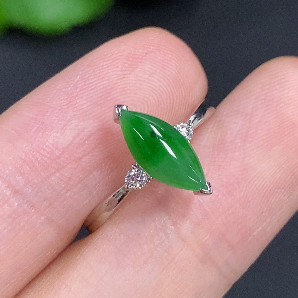 Jadeite freeform ring in 18K gold with diamond accents, featuring a unique, organic shape and elegant gemstone details.