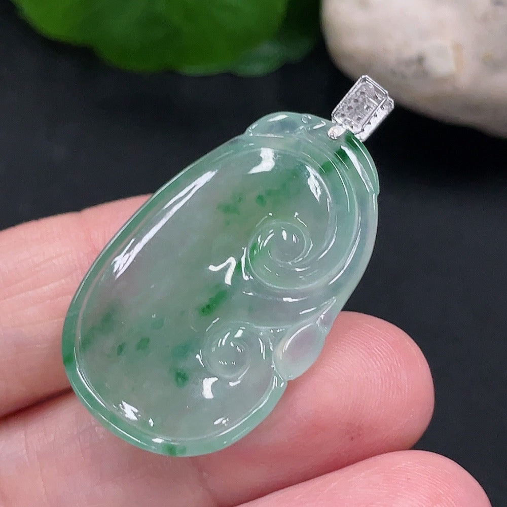 Jadeite Ruyi pendant with 18K gold and diamond accents, featuring a smooth jade surface and intricate gold detailing.