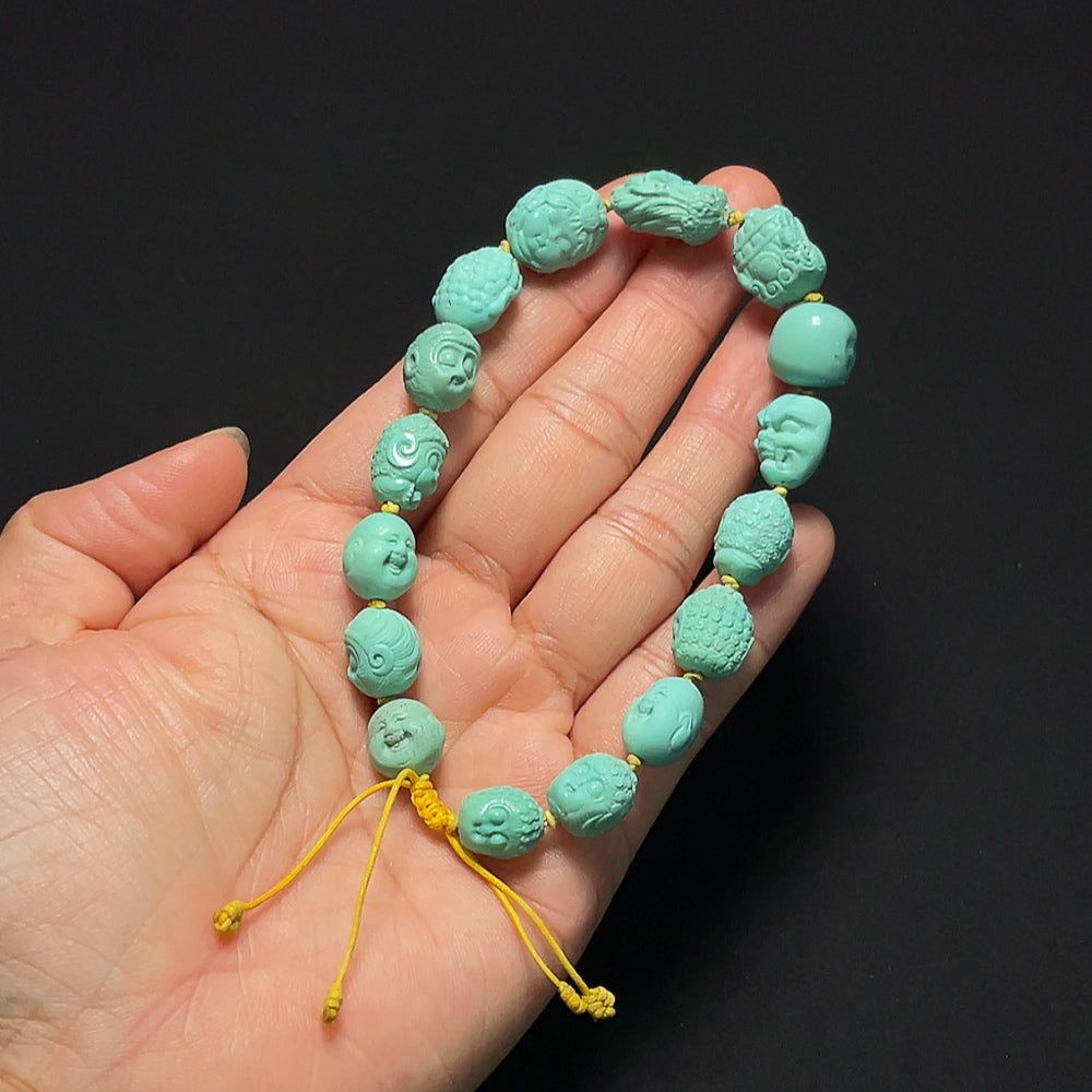 Turquoise bracelet by HKHQ featuring round turquoise beads strung on a durable elastic band for stylish wear
