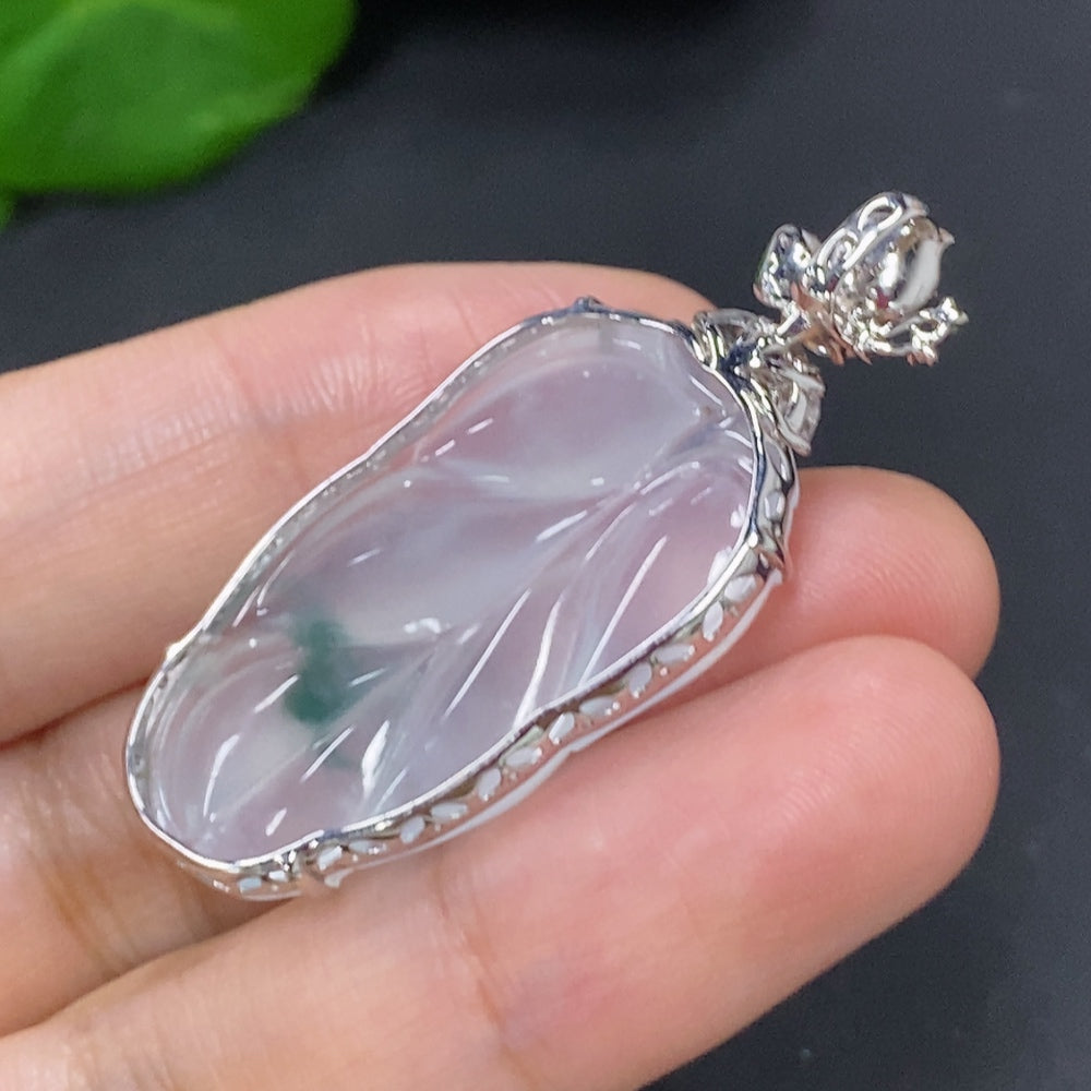 Jadeite leaf pendant necklace with 18K gold and diamond accents, elegant jewelry piece from HKHQ.