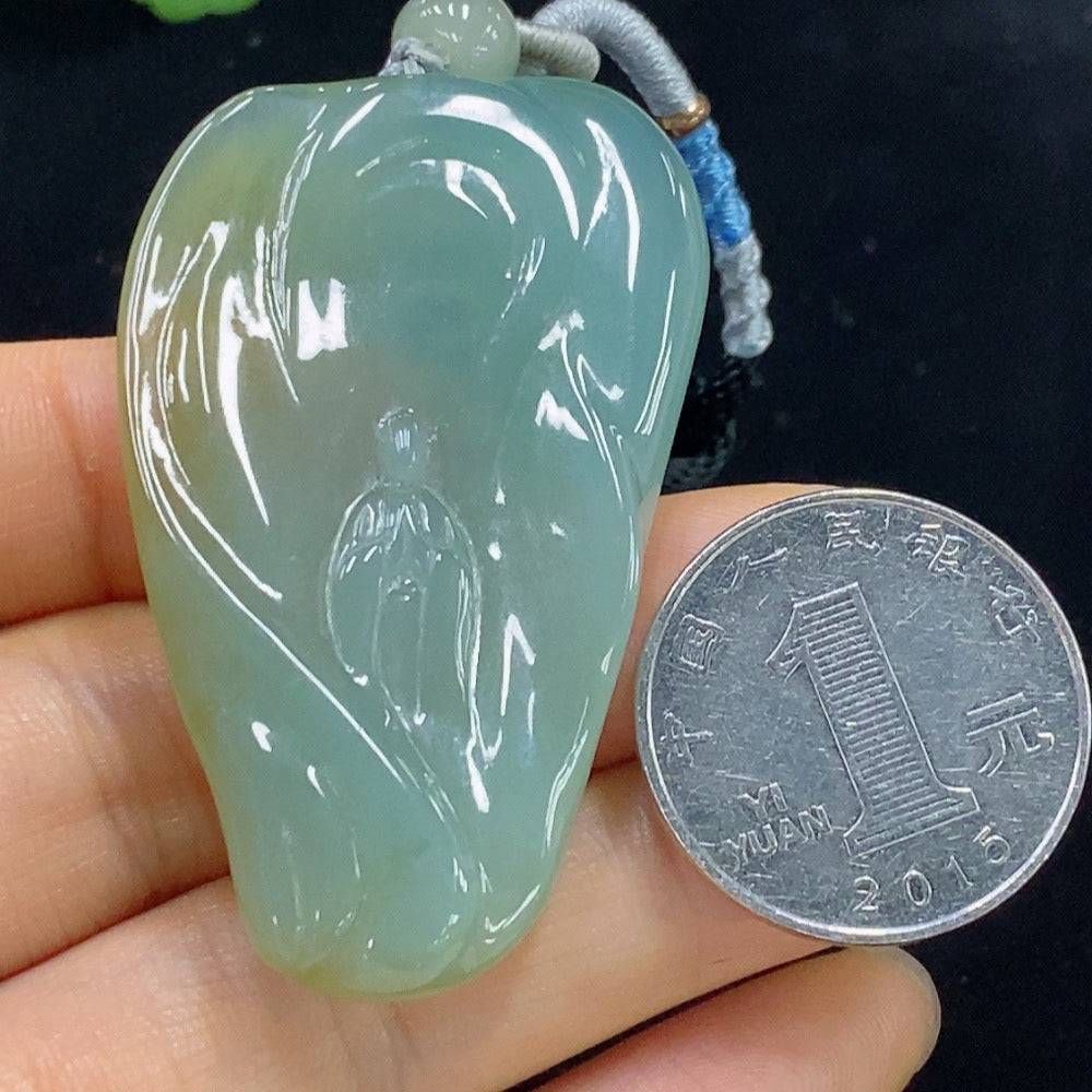 HUILIU HQ jadeite formless pendant showcasing smooth, polished jade with natural green hues and unique organic shape.