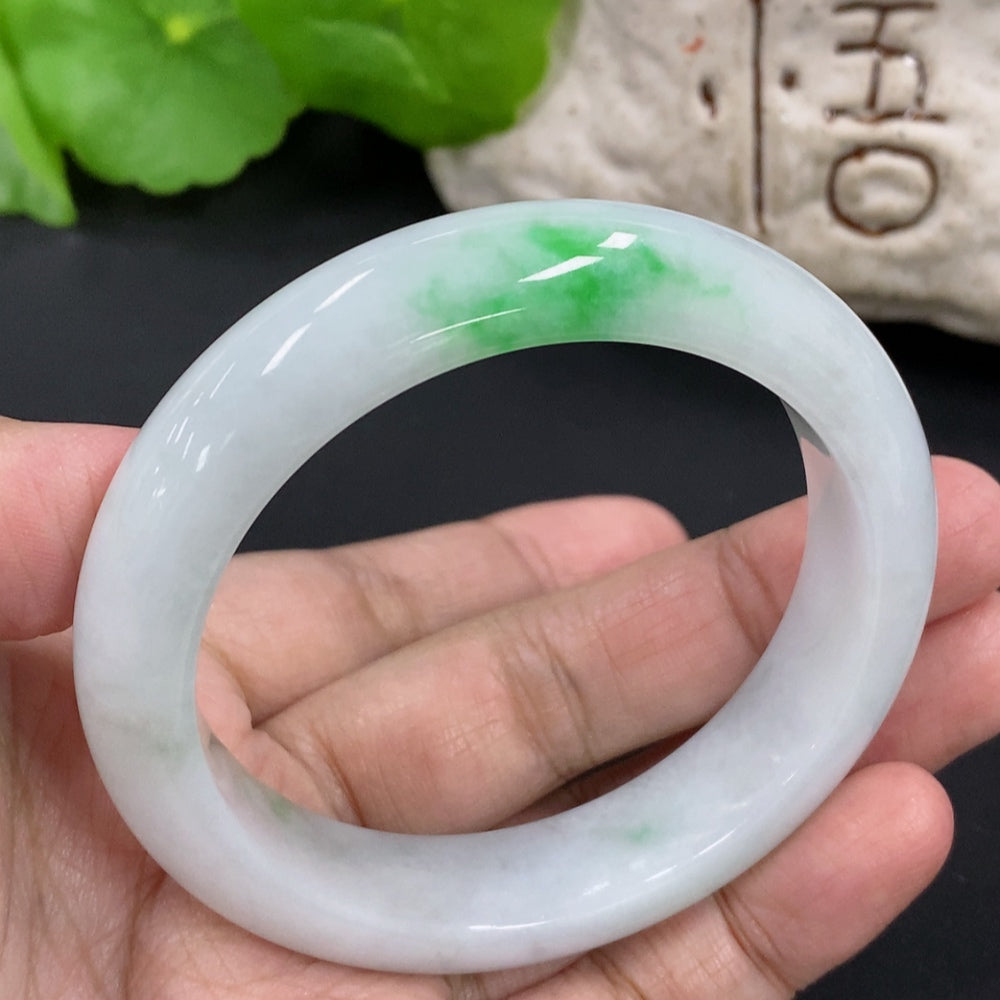 HKHQ jadeite round bangle in size 52.7, weighing 53.25g, showcasing smooth, polished jadeite with a glossy finish.